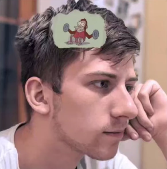 A photo of me with monkey from simpsons clapping plates inside my head